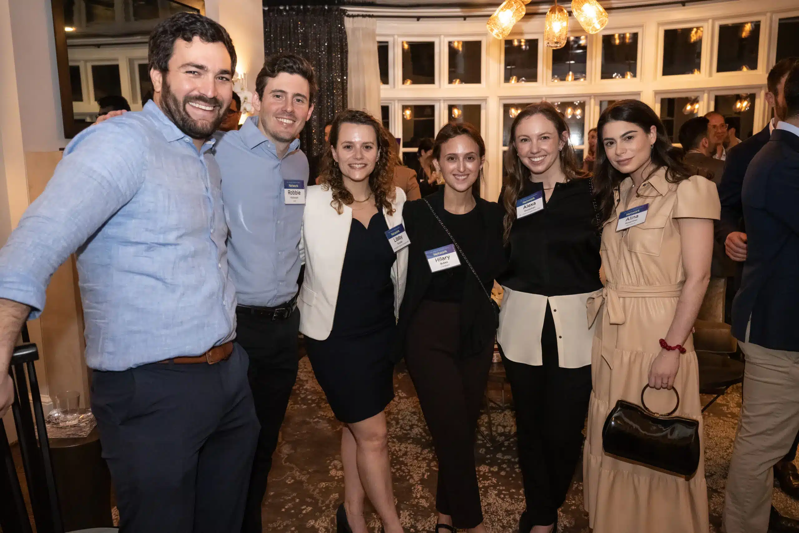 A group of people at a Network event