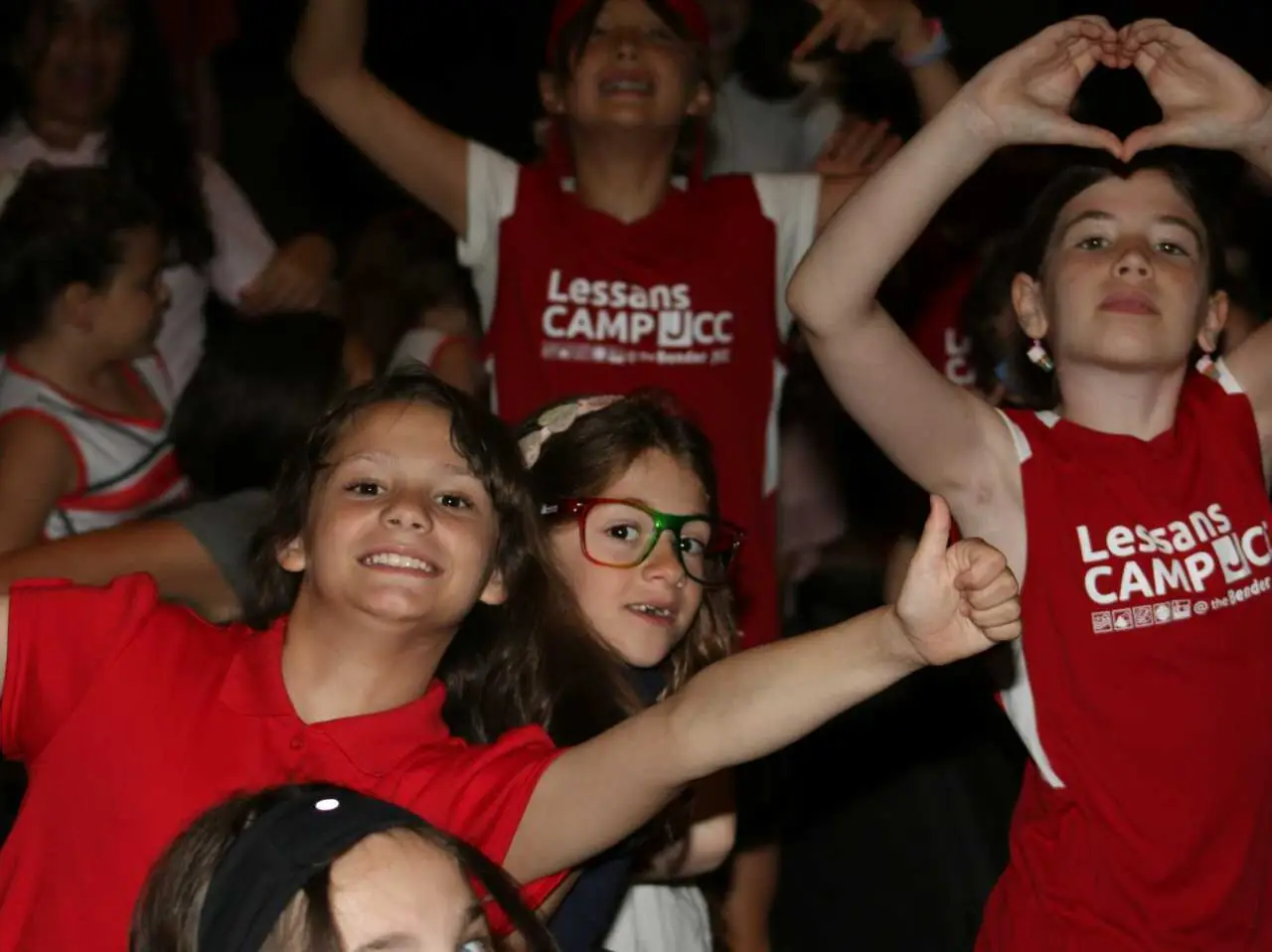 Children at camp, smiling.